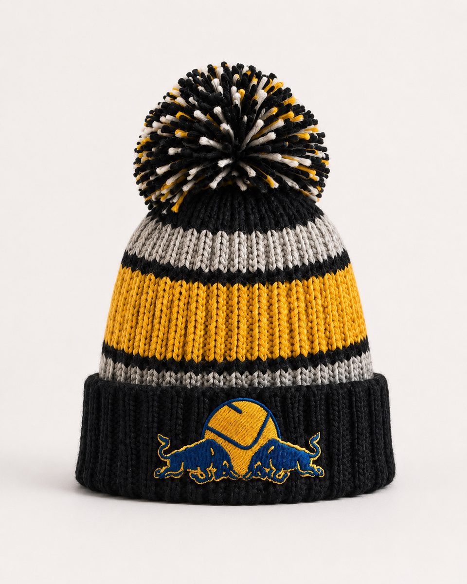 Front view of a black, yellow and grey Dirty Leeds® bobble hat with a pom-pom and embroidered cuff detail.